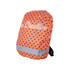 An orange backpack cover with navy polka dots and a reflective strip, featuring a logo.