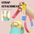 A drink bottle with a pastel blue and yellow design, featuring a detachable multi-coloured shoulder strap and a logo.