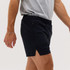 Running shorts in black, featuring a side split and an elastic waistband. Includes a small pocket and a logo.