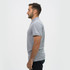 A grey polo shirt for men, featuring a collar and a side view display. The shirt has a logo on it.