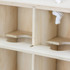 A wooden wine gift box with three compartments and rope handle, showcasing a natural wood finish.