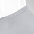 A pair of grey ankle socks displayed on a mannequin. The socks feature a ribbed design and a branding logo.