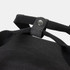 A black canvas cooler bag featuring sturdy straps and a snap button closure. It has a simple design with no visible branding.