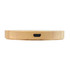 A round bamboo wireless charger with a sleek, natural finish and a black charging port on the side.