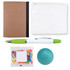 A notebook with a brown cover, a white zip pouch, a green and white pen, a teal stress ball, and a bag of colorful candy.