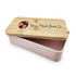 A pink lunch box with a bamboo lid featuring a logo, open to reveal a divided interior.