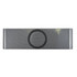 A sleek grey speaker with a textured surface, featuring a circular area for inductive charging.