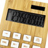 A bamboo calculator featuring a large digital display and white buttons. The design is eco-friendly with a natural finish.