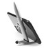 A silver stylus pen positioned as a stand for a smartphone, featuring a sleek metal design and a branding logo.
