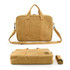 A tan satchel with dual handles, a detachable strap, and a logo, featuring a smooth, textured surface.