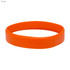 An orange silicone wristband with a smooth surface and a circular shape. It features a logo.