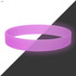 A pink silicone wristband with a glowing effect, set against a contrasting dark background.
