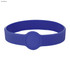 A dark blue silicone wristband featuring a circular design element. It includes a logo or branding.