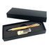 A black gift box containing a wooden pen and a silver USB drive, both neatly arranged inside.