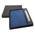 A navy notebook and pen set presented in a black gift box, featuring a sleek design and a logo.