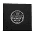 A black menu cover featuring a circular logo with white text and a burger illustration.