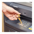 A gold no contact keychain with a keyring is being used at an ATM keypad.
