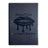 A black refillable journal with a glossy lip graphic and branding on the front cover.