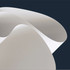A soft, curved surface in shades of grey, resembling a flexible material against a dark background.