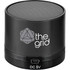 A black cylindrical Bluetooth speaker with a textured top and a logo on the side.
