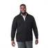 A man wearing a black eco fleece full zip jacket, smiling and standing against a white background.
