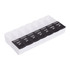 A white and black recycled AM/PM pill case with compartments labelled for each day of the week.
