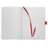A bound journal in white with red accents, featuring lined pages and a red ribbon bookmark.