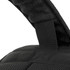 A close-up of a black backpack strap with textured padding and a webbed loop for support.