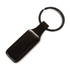 A rectangular key ring in black with a smooth finish and a metal ring attachment.
