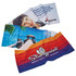 Three vibrant sublimation sports towels in various designs, featuring a mix of colours and images, with a logo present.