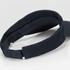 A black sun visor with a curved brim and adjustable strap.