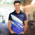 A man wearing a blue and navy polo shirt with a logo and a dynamic striped design.