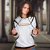 A woman is wearing a white and black custom sports hoodie with an orange accent and logo.