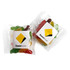 A packet of Jelly Babies featuring assorted colours, including green, red, yellow, and orange, with a logo on the packaging.