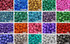 A vibrant assortment of coloured foils in various shades, including electric blue, gold, and hot pink, arranged in squares.