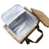 A square wicker picnic cooler basket in natural wood with a beige lid and an insulated silver interior.