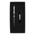 A black pen and bottle opener keyring set nestled in a black gift box with a branded logo.