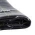 A folded grey beach towel featuring a design in green and white, with a logo visible on the fabric.