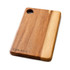 An acacia serving board featuring a natural wood finish with a circular handle and engraved branding.