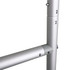 A metallic dispenser stand featuring silver pipes with numbered markings.