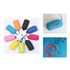 A collection of brightly coloured, compact jackets with hoods and branding, arranged in a circular pattern.