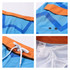 Men's knee-length swim shorts in blue and orange with a geometric pattern, featuring a logo and mesh lining.