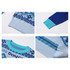 A unisex sweater featuring a blue and turquoise jacquard pattern with ribbed cuffs and hem. Includes a logo.