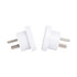 A white universal travel adapter designed for use from AU to US, featuring two pins for connectivity.