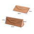 A foldable cork glasses case in natural brown, featuring an embossed logo and a triangular shape when opened.