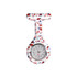 A silicone nurse watch in a colourful speckled pattern featuring a white base with red and blue accents.