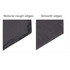 A pair of slate coasters featuring one with natural rough edges and the other with smooth edges. Both are dark grey.