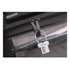 A silver metal coded lock attached to a black zipper on a transparent bag, featuring a logo.