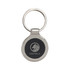 A silver keyring with a round design and a black centre featuring a logo.