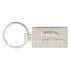 A silver custom-shaped die struck keyring with a logo and branding details.